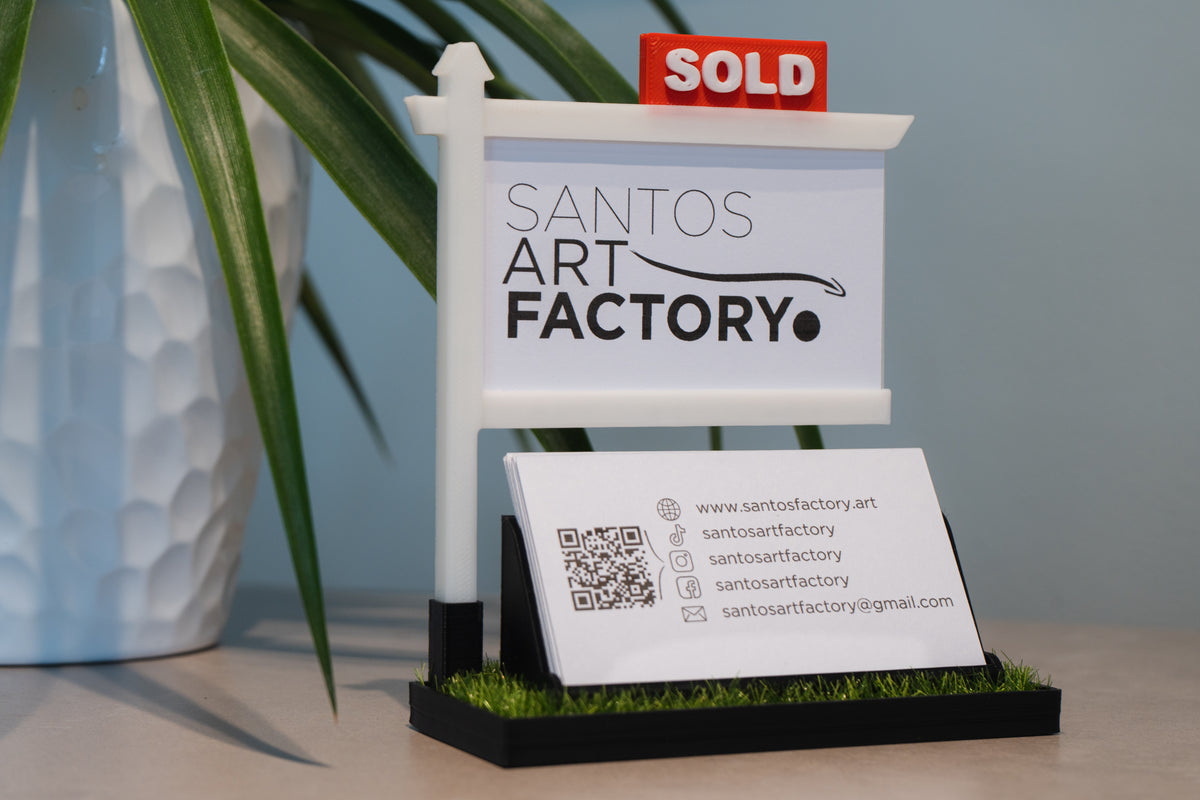 Black real estate business card holder with red SOLD sign