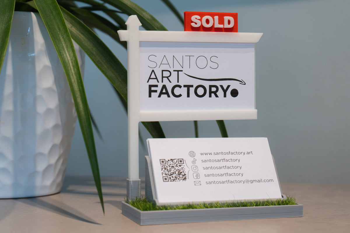 Gray real estate business card holder with red SOLD sign